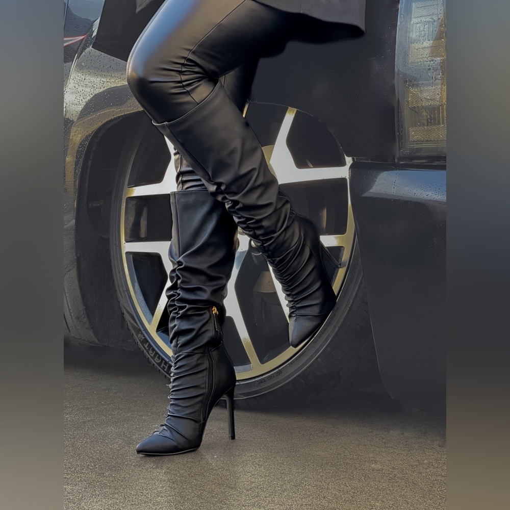 Black pointed toe boots